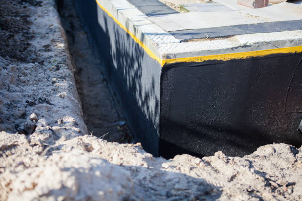 Professional Wet Basement Repair technician working in Burlington, MI